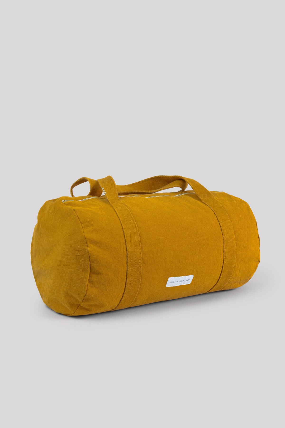 Mini bowling bag in saffron yellow organic cotton canvas